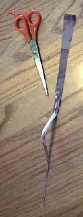 Cut Long Triangles from scrap paper.