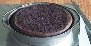 tcaketopoff.jpg (30046 bytes)
